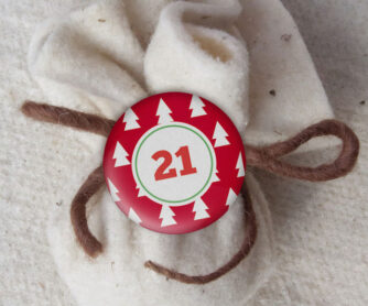 XMAS2 Kalender Button an Säckchen