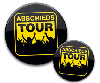 JGA Buttons Abschiedstour gelb schwarz feiernde Leute